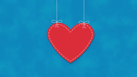 animated closeup romantic red heart on blue valentines day background