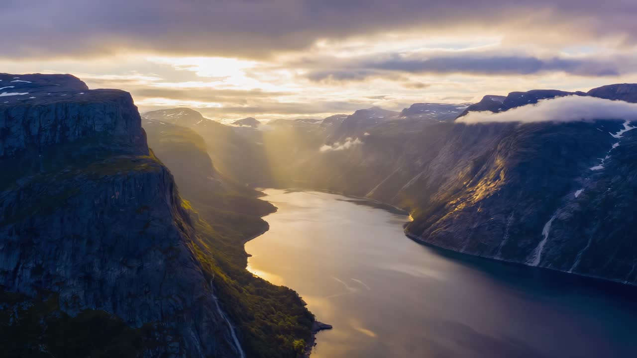 Aerial view of a fjord surrounded by mountains