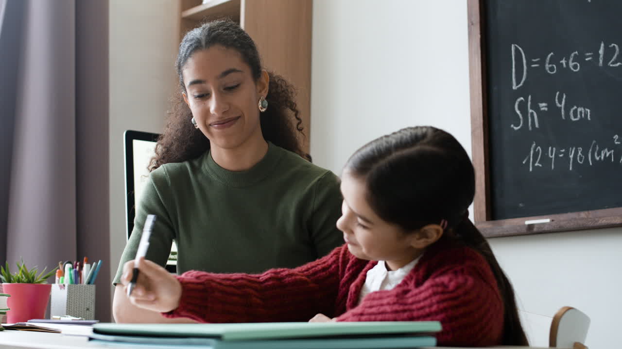 Teacher Helping Student with Math