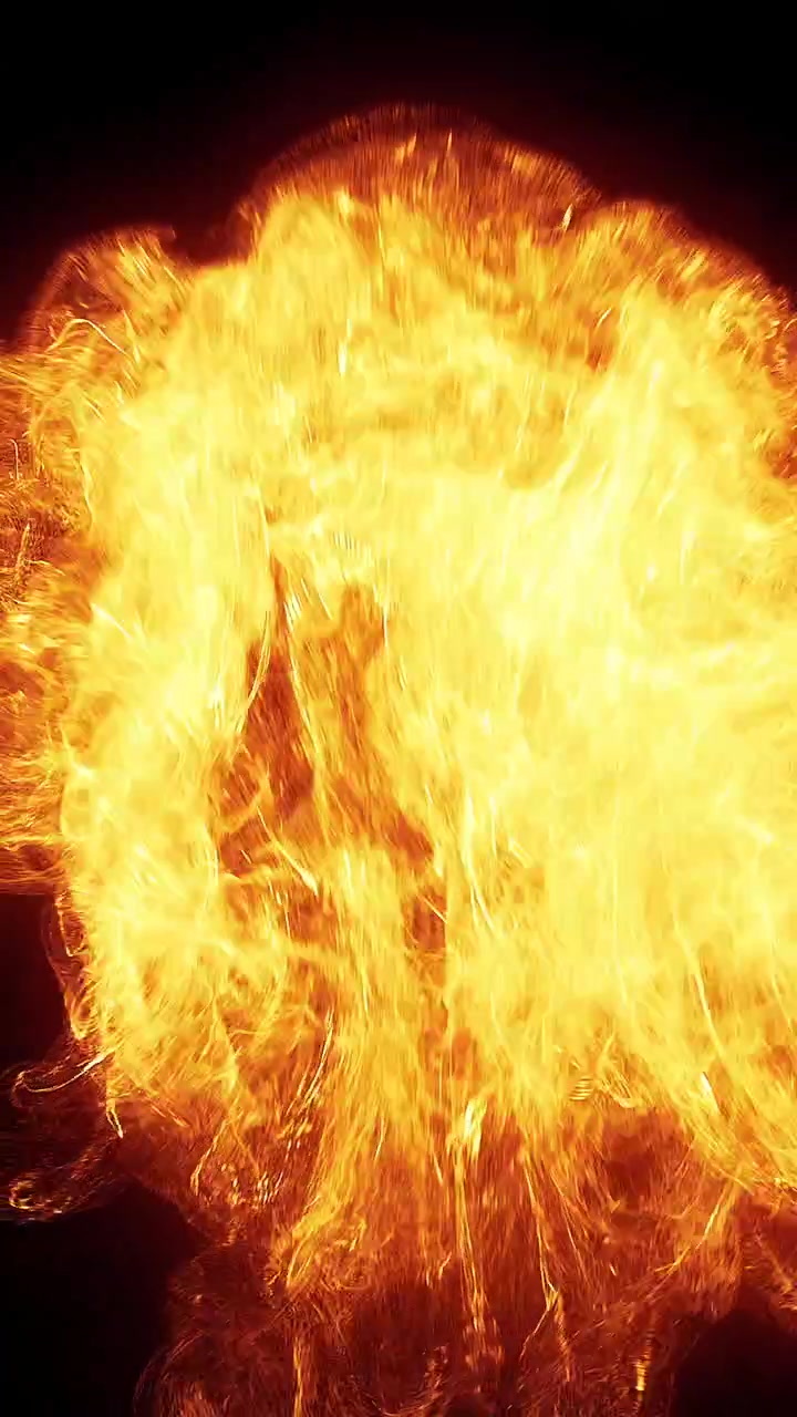 Large Fireball Exploding Against a Black Background
