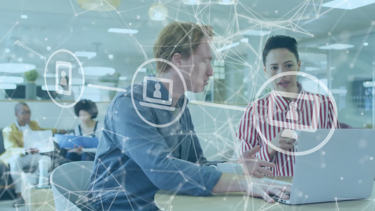 Animation of flowchart of icons and connected dots, caucasian coworkers discussing reports on laptop