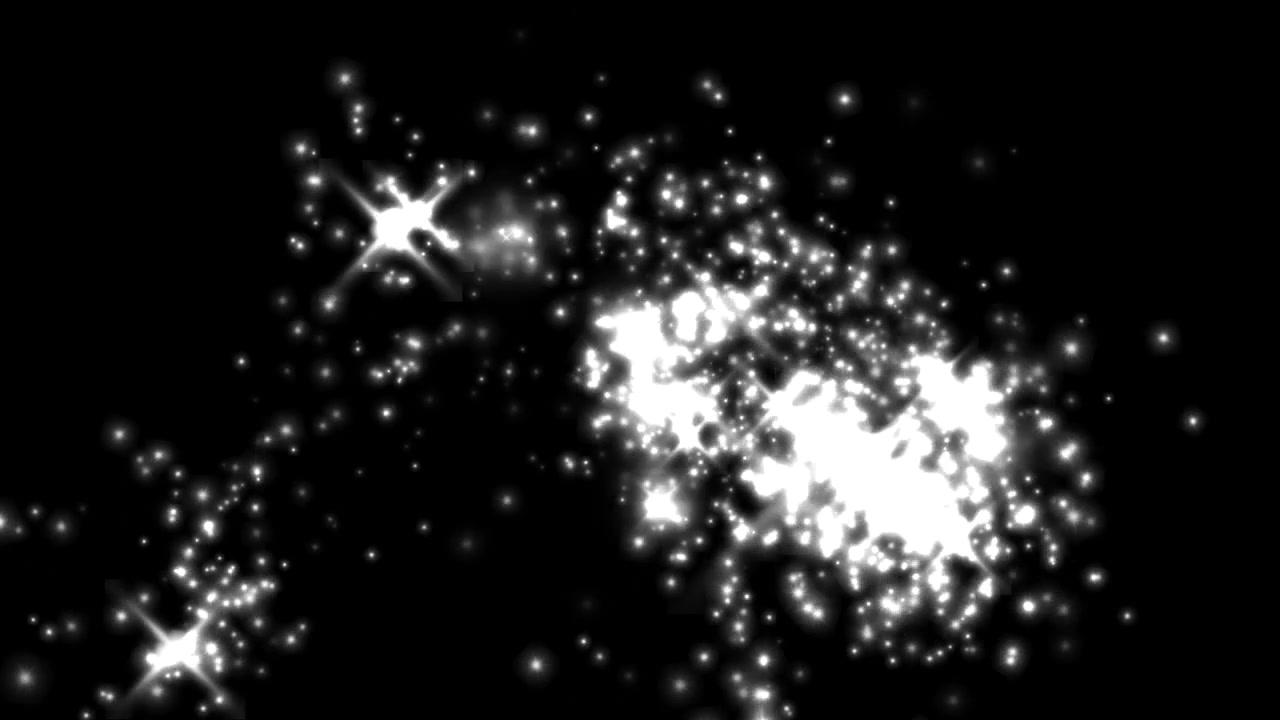 Particelle di glitter bianche astratte scintillanti su sfondo nero