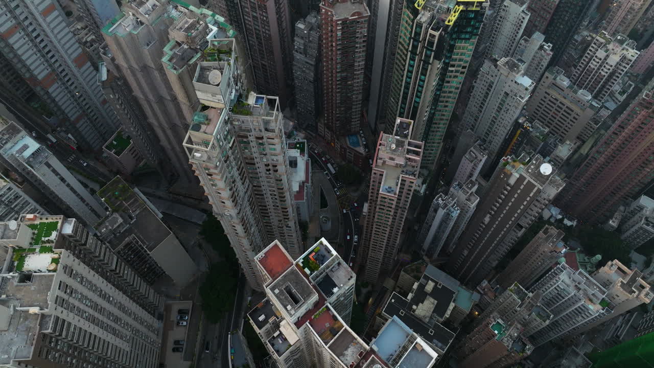 High-Angle Aerial View Of Hong Kong's Dense Urban Area. Residential And Commercial Buildings