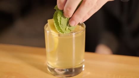 bartender preparing a cocktail in a bar