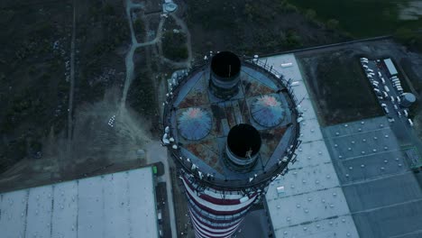 aerial view, circular camera movement around the idle chimney