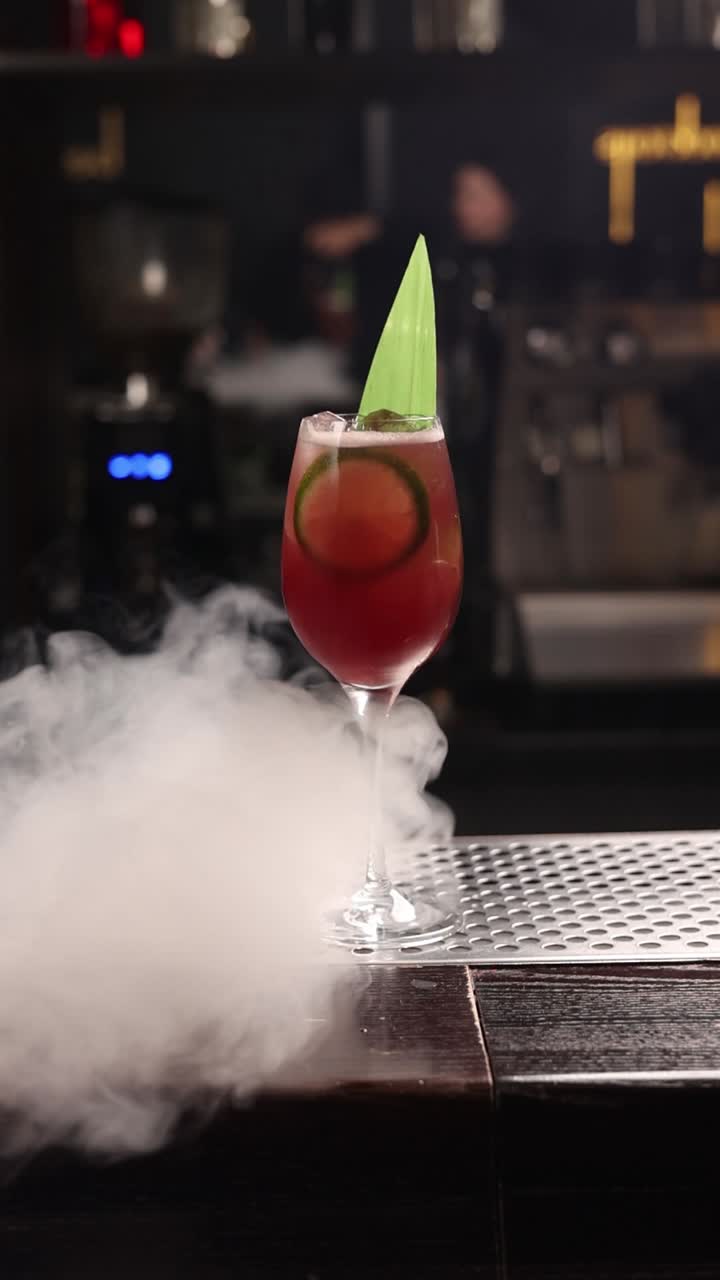 Red Cocktail at a Bar with Smoke
