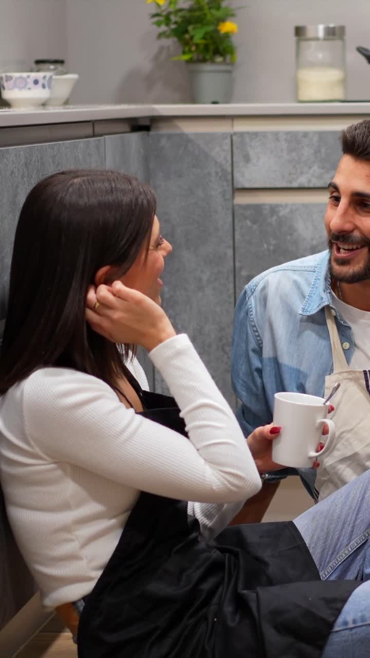 Couple relaxing in the kitchen