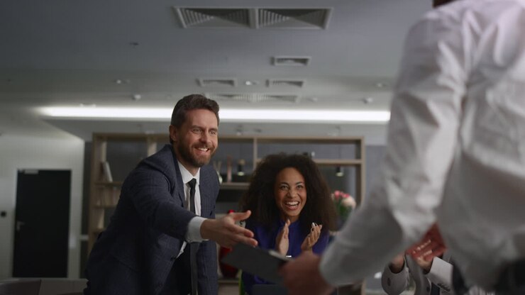 Multiethnic business partners shaking hands