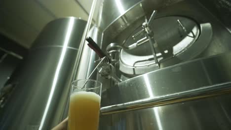 modern craft brewery. craft beer production. modern equipment in brewery, metal tanks, alcoholic drink production