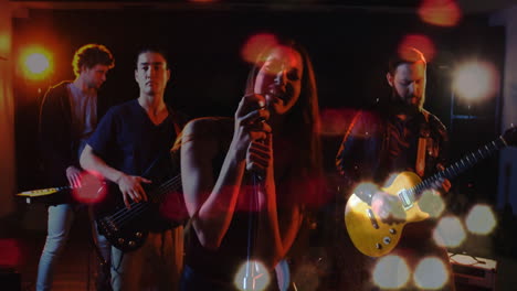 music band performing under stage lights, with animated soundwave overlays and mic bokeh effects