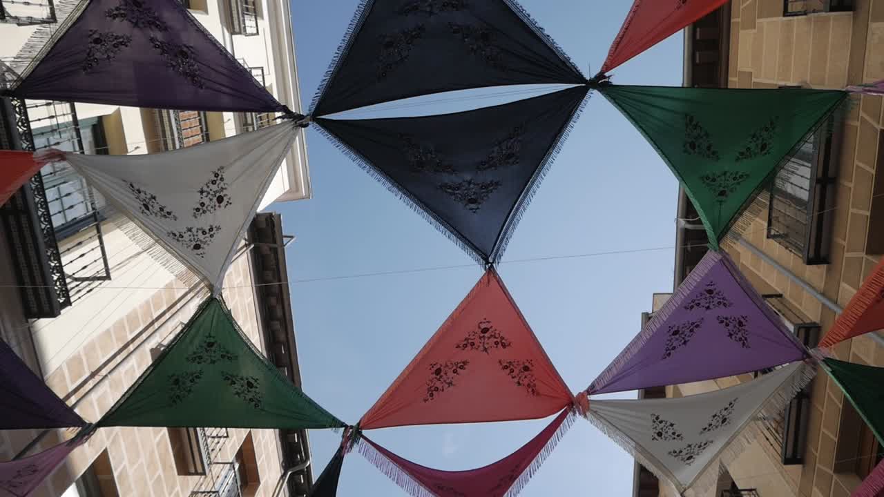 Decorative Mantones de Manila during La Paloma festivities in La Latina, Madrid