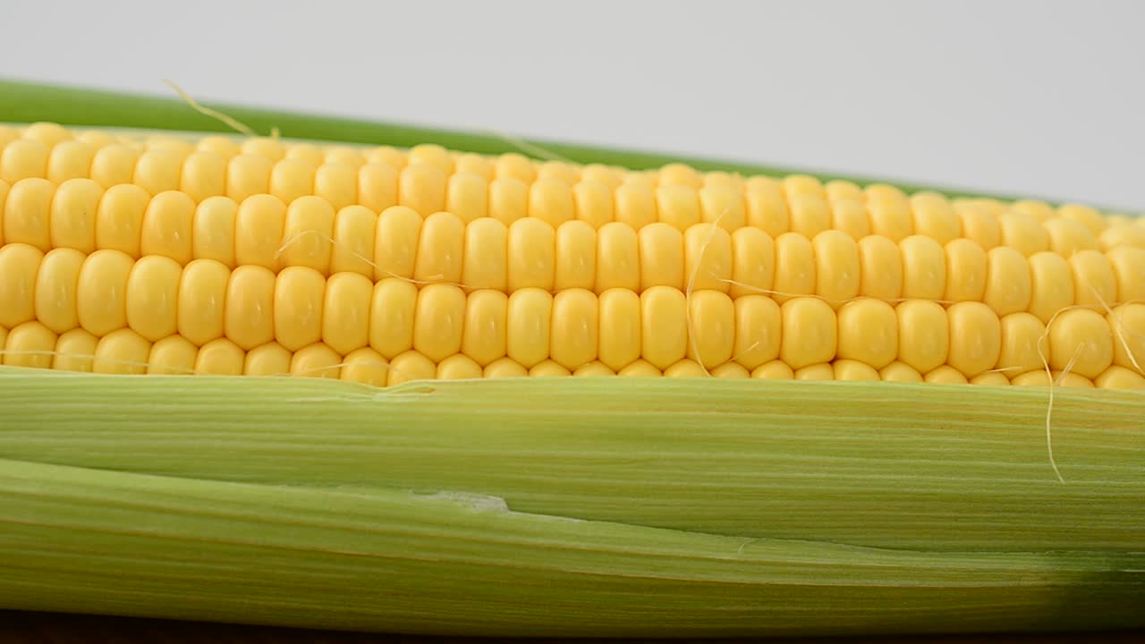 Corn on a kitchen board. Shooting in the movement