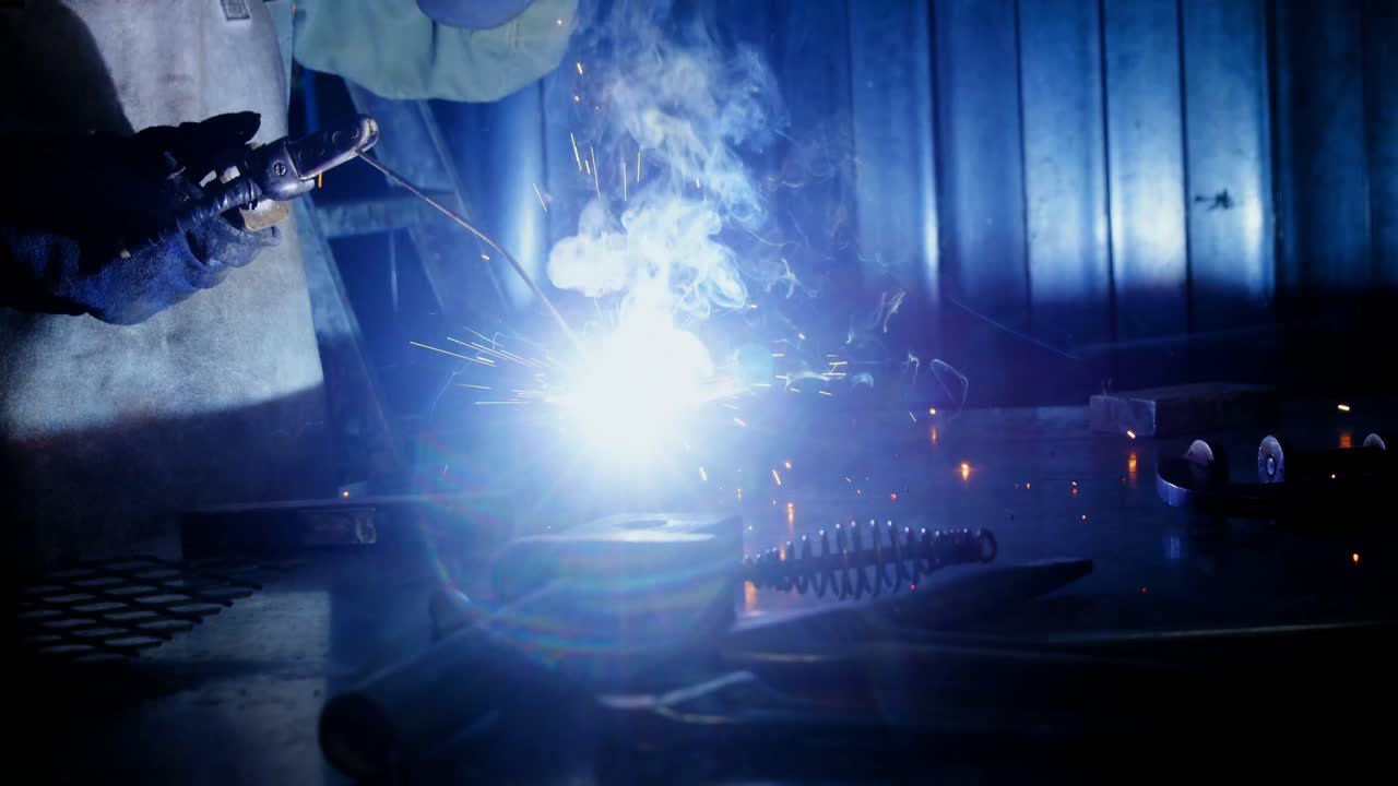 Welder welding a metal