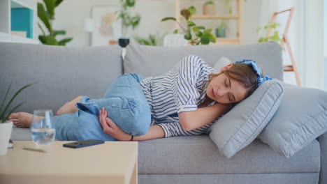 Sad-Depressed-Lonely-Woman-On-Sofa