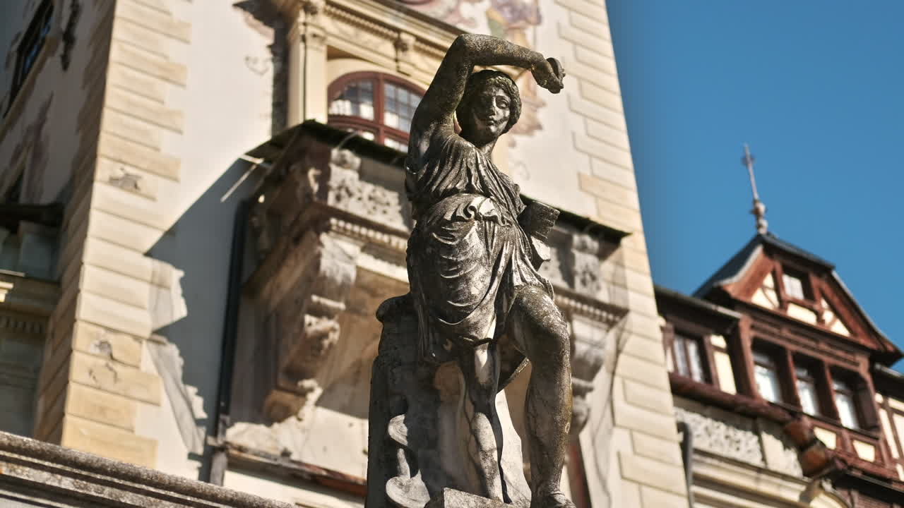 Vertical view of a sculpture at The Peles Castle in Romania. Castle on the background
