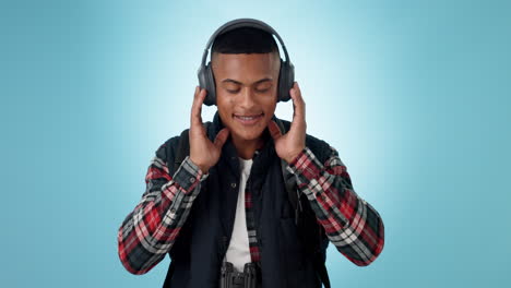 headphones, happy man and dancing studio