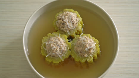 stuffed bitter gourd with seasoned minced pork and vermicelli soup bowl