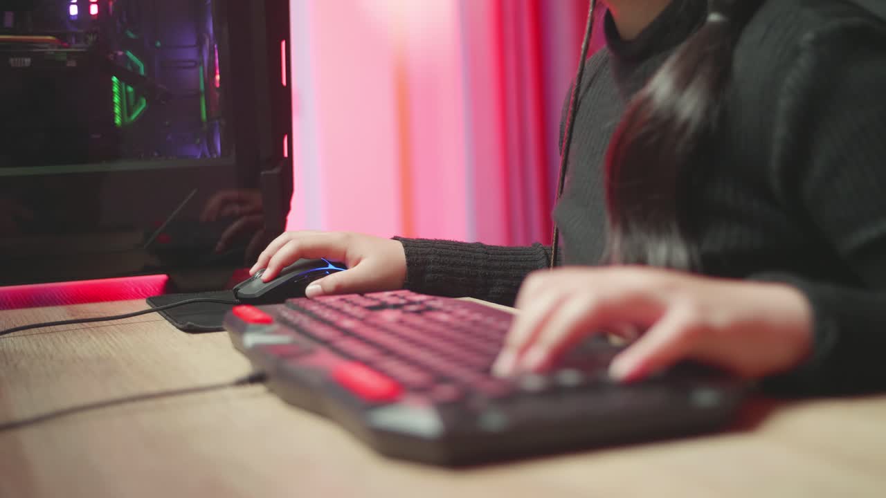 Woman gaming on computer