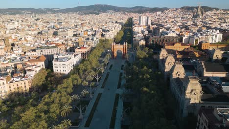 Aerial-Pullback-Reveals-Passeig-de-Lluís-Companys,-Arc-de-Triumph-Barcelona,-Spain