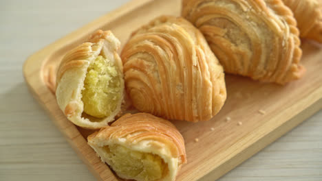 curry puff pastry stuffed beans on wooden plate