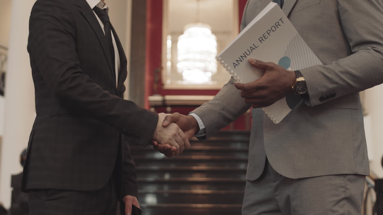 Cropped Business Partners Shaking Hands