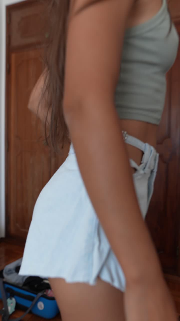 Fashionable woman wearing denim shorts