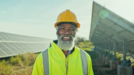 portrait of black man at solar panel plant