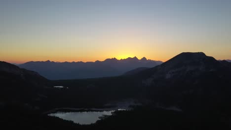 beautiful sunset over silhouetted mountains in mammoth lakes, sierra nevada mountains, california usa