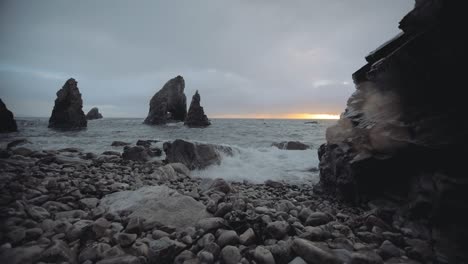crohy head in donegal ireland ocean wave on rocks in sunset