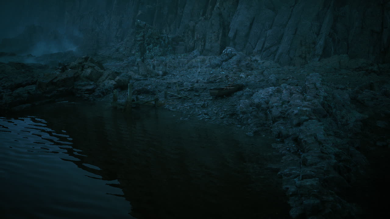 Reflective tidal pool beneath basalt cliff cinematic stillness