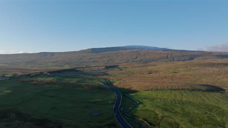 establishing drone shot yorkshire dales landscape ribblehead viaduct sunset