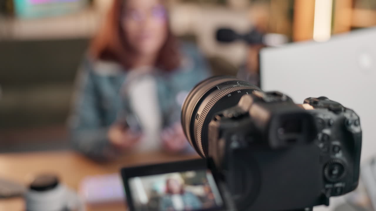 Camera setup for vlogging with a woman in the background