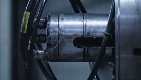Detailed tire building machine rotating with rubber blank at technological plant