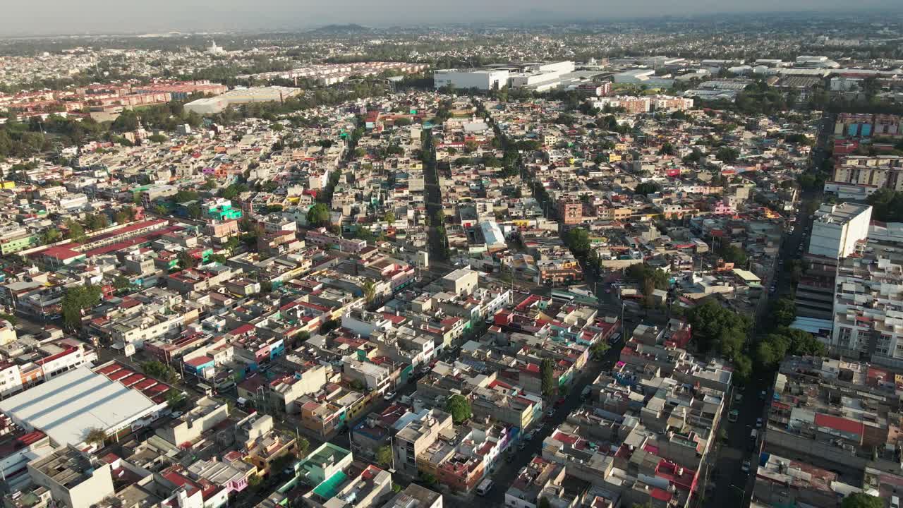 Cityscape above north mexico city flyover aerial drone establishing shot, traveling left