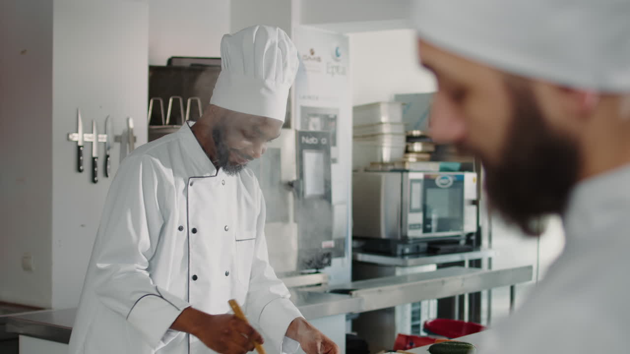 African american man taste testing vegetable soup on stove