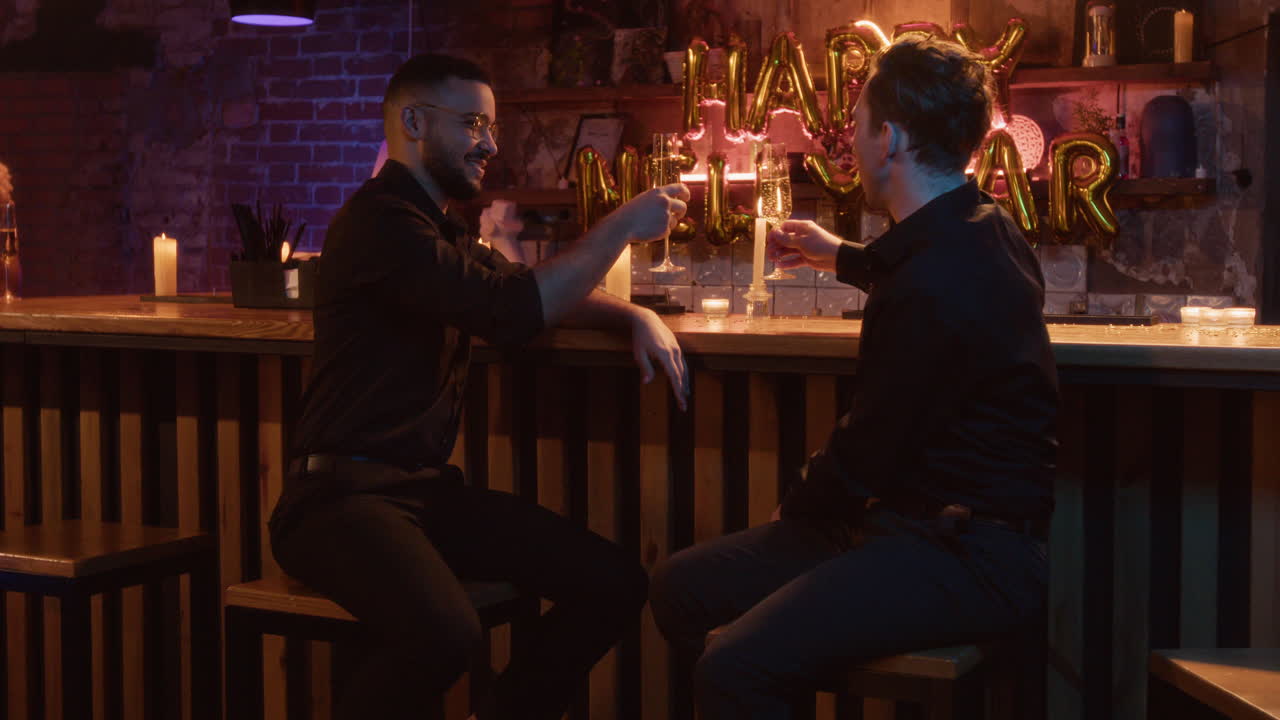 People celebrating New Year's Eve at a bar