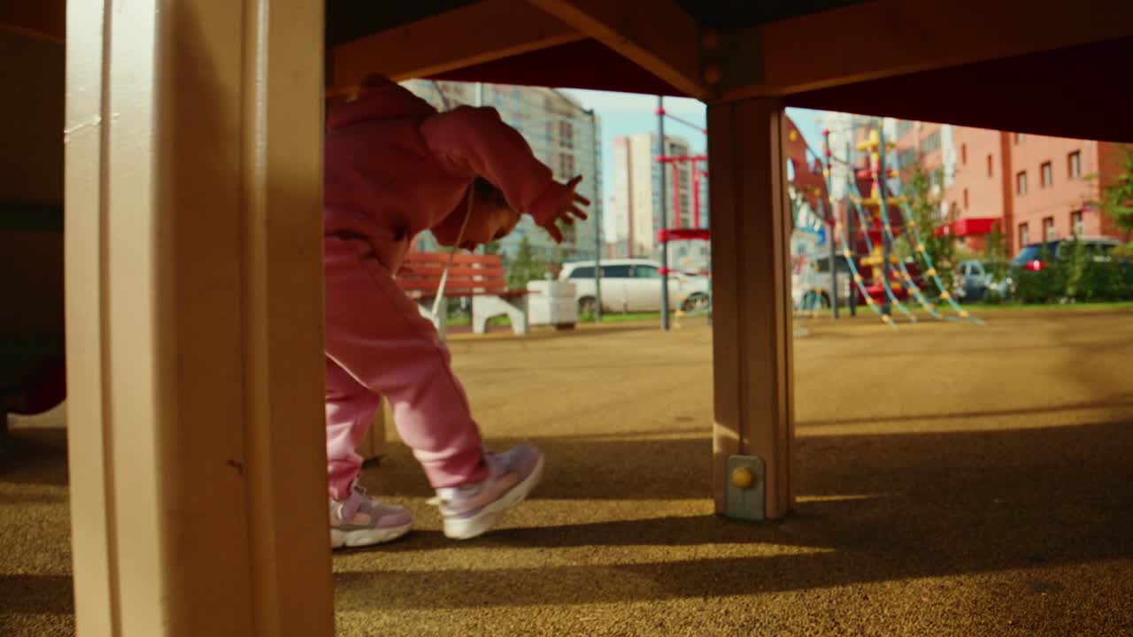 A Joyful Day at the Playground: A Charming Child Adventures Through the Equipment, Full of Curiosity and Excitement in a Vibrant Outdoor Setting