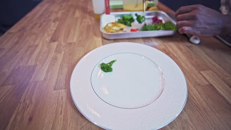 Caribbean-chef-plating-pan-seared-cod