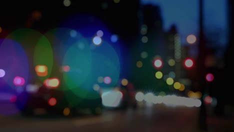 Animation-Leuchtender,-Lebendiger-Lichtpunkte-über-Unscharfem-Straßenverkehr