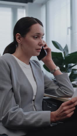 businesswoman on phone in office