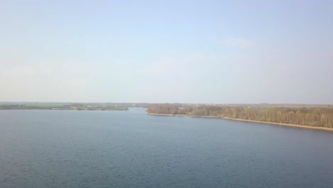 fly over the lake drone footage