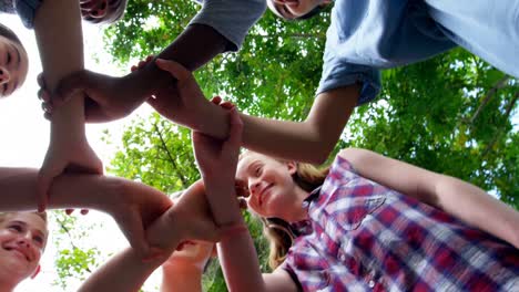 schoolkids holding each other hands in school premises 4k