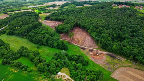 aerial 4k drone footage of environmental reality: rapid deforestation by human hands