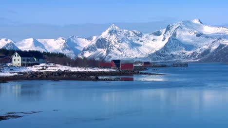 snow covered peaks and lakes decorate a remote village in the arctic lofoten islands norway 1