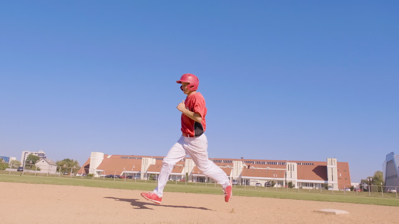 Baseball player runs the bases during a game