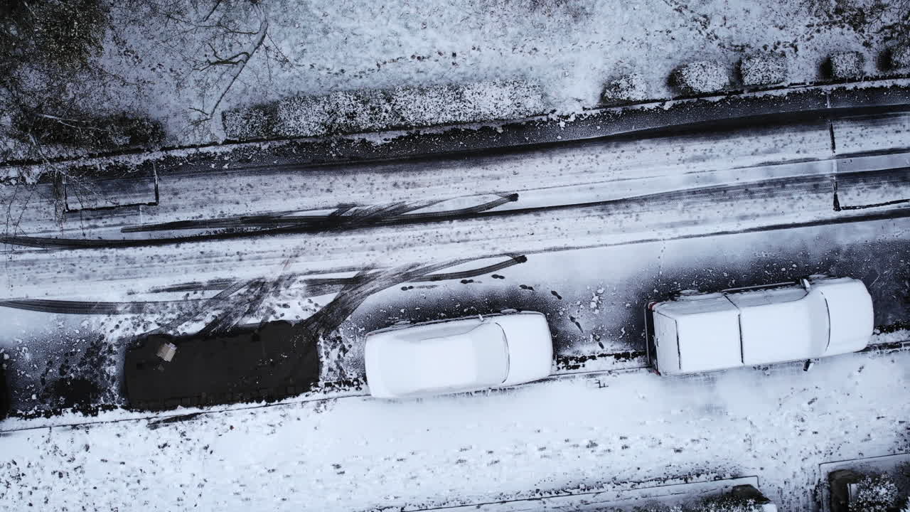 Aerial View of Cars on Snow-Covered Road