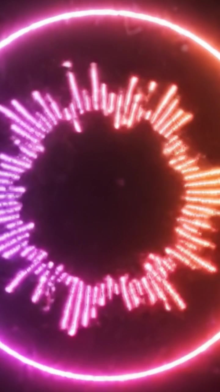 Visualizzazione dinamica di onde sonore in vivaci motivi circolari, che passano dal blu e rosa all'arancione fuoco, catturando l'essenza del ritmo e dell'energia della musica.