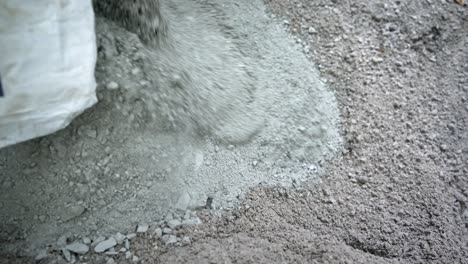 worker pouring cement