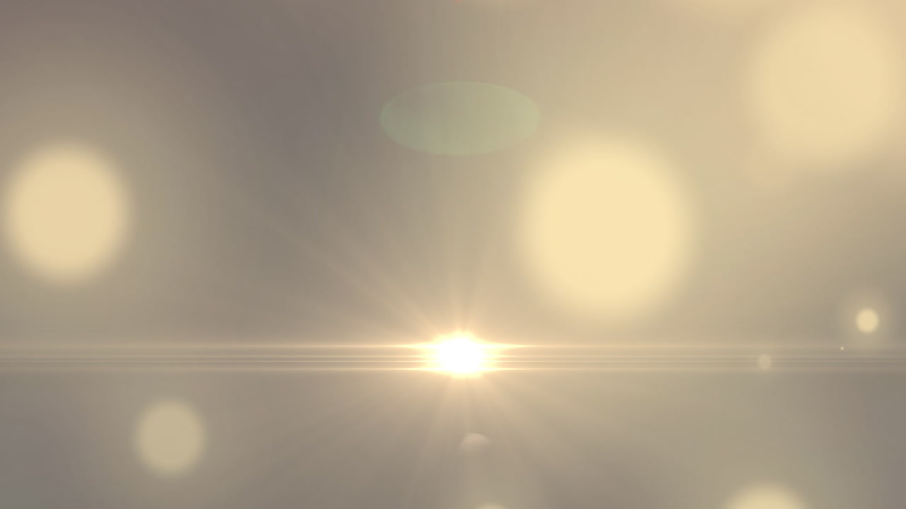 어두운 배경 위에 반 ⁇ 이는 빛의 반점의 애니메이션