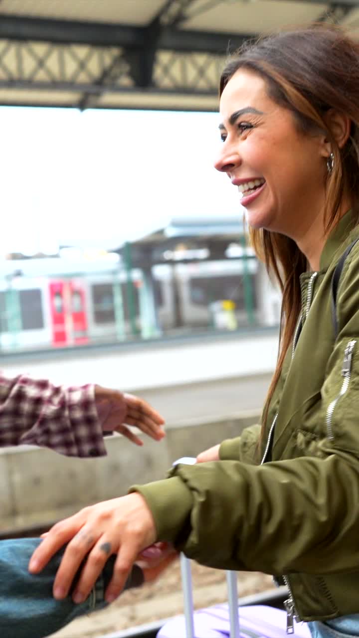 Friends Reunited at Train Station